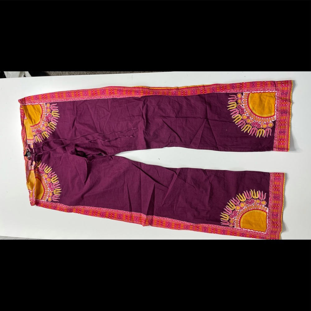 Floral pants with draw string size medium, great condition never worn